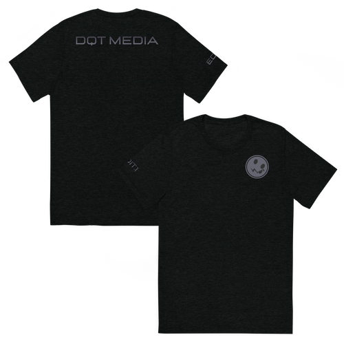 This is a black t-shirt featuring a sleek design, prominently showcasing the 'DQT Media' branding on the back. The front view presents a clean and minimalist look, while the back view highlights the brand's logo in bold, contrasting colours, making it stand out. The shirt is crafted from soft, breathable fabric, ensuring comfort and style for everyday wear. The fit is tailored to be flattering, making it suitable for a variety of occasions.