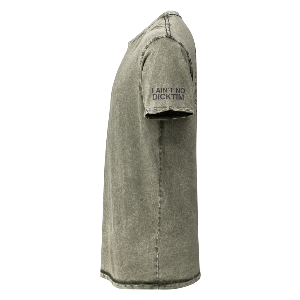 A short-sleeve t-shirt with a mineral-washed, acid-faded olive green finish, shown from the side. with text "I AIN'T NO DICKTIM"