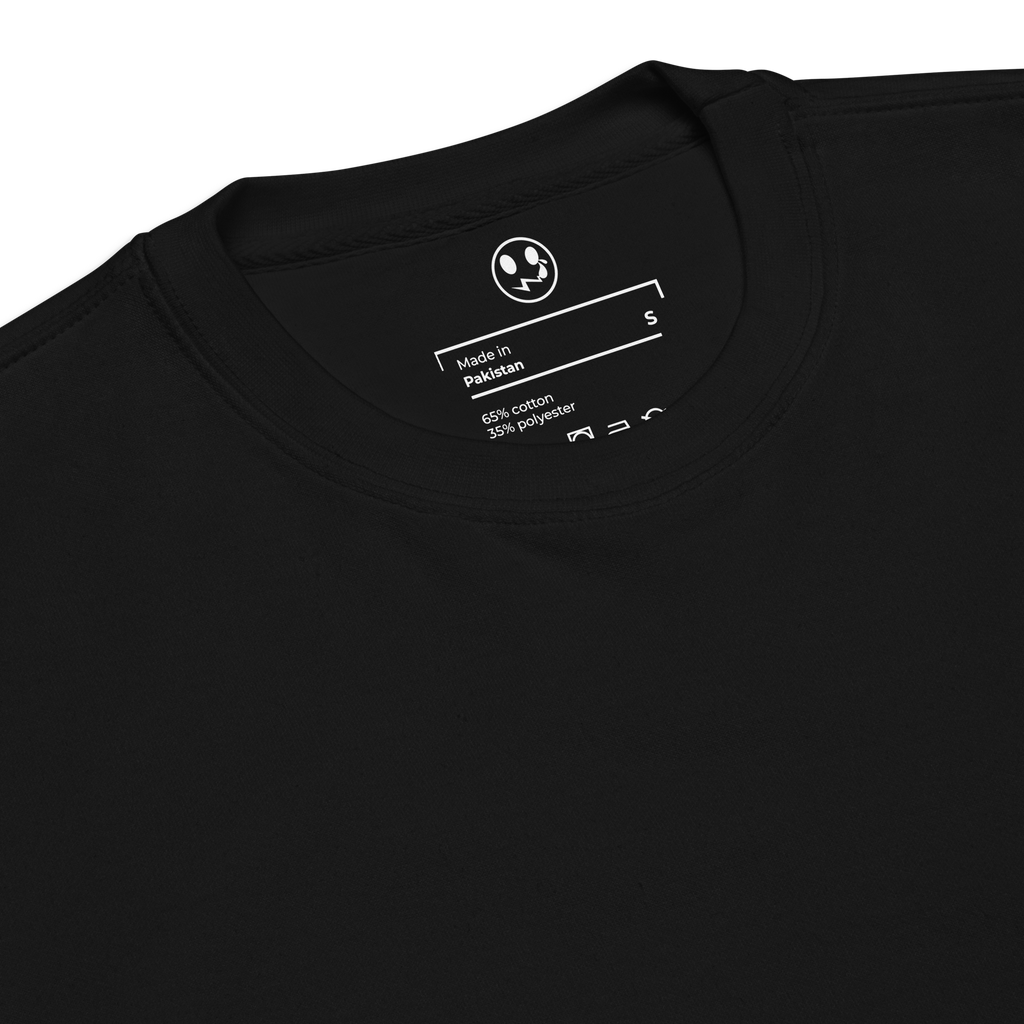 A sleek black T-shirt made from soft, comfortable fabric. It features a discreet label sewn into the collar, which showcases a combination of stylish text and unique symbols, adding personality to the garment.