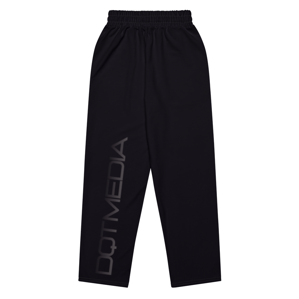 A pair of sleek black pants featuring bold 'DQTMEDIA' text prominently displayed against a crisp white background, adding a striking contrast that draws attention. The design combines style and comfort, making these pants perfect for casual outings or as part of a trendy streetwear ensemble.