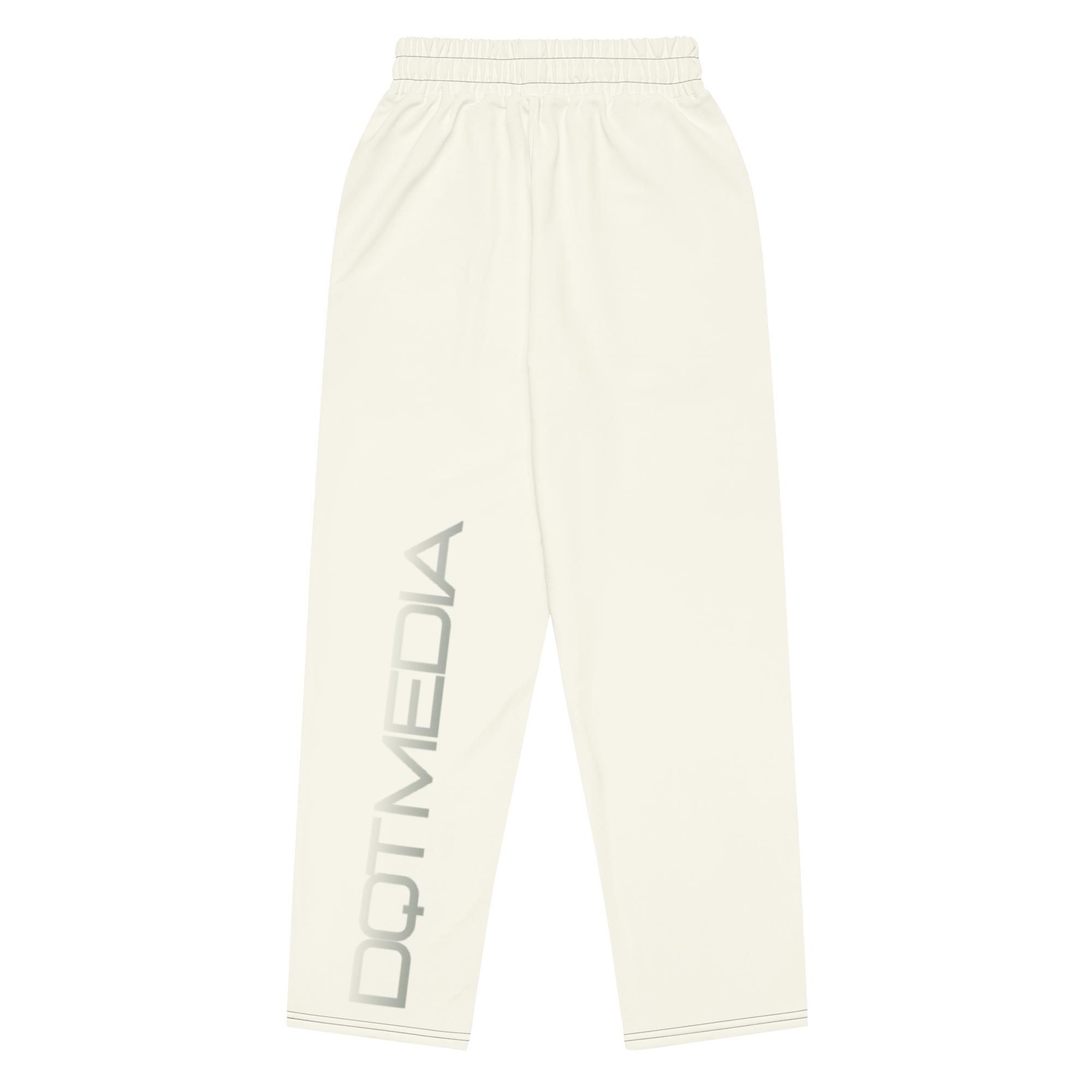 These are stylish cream-colored pants featuring the 'DQTMEDIA' logo elegantly displayed on a matching cream background. The logo is subtly integrated into the design, creating a cohesive, polished look that pairs well with a variety of outfits. Whether you're dressing up for a casual outing or keeping it relaxed at home, these cream pants provide both comfort and a touch of sophistication.