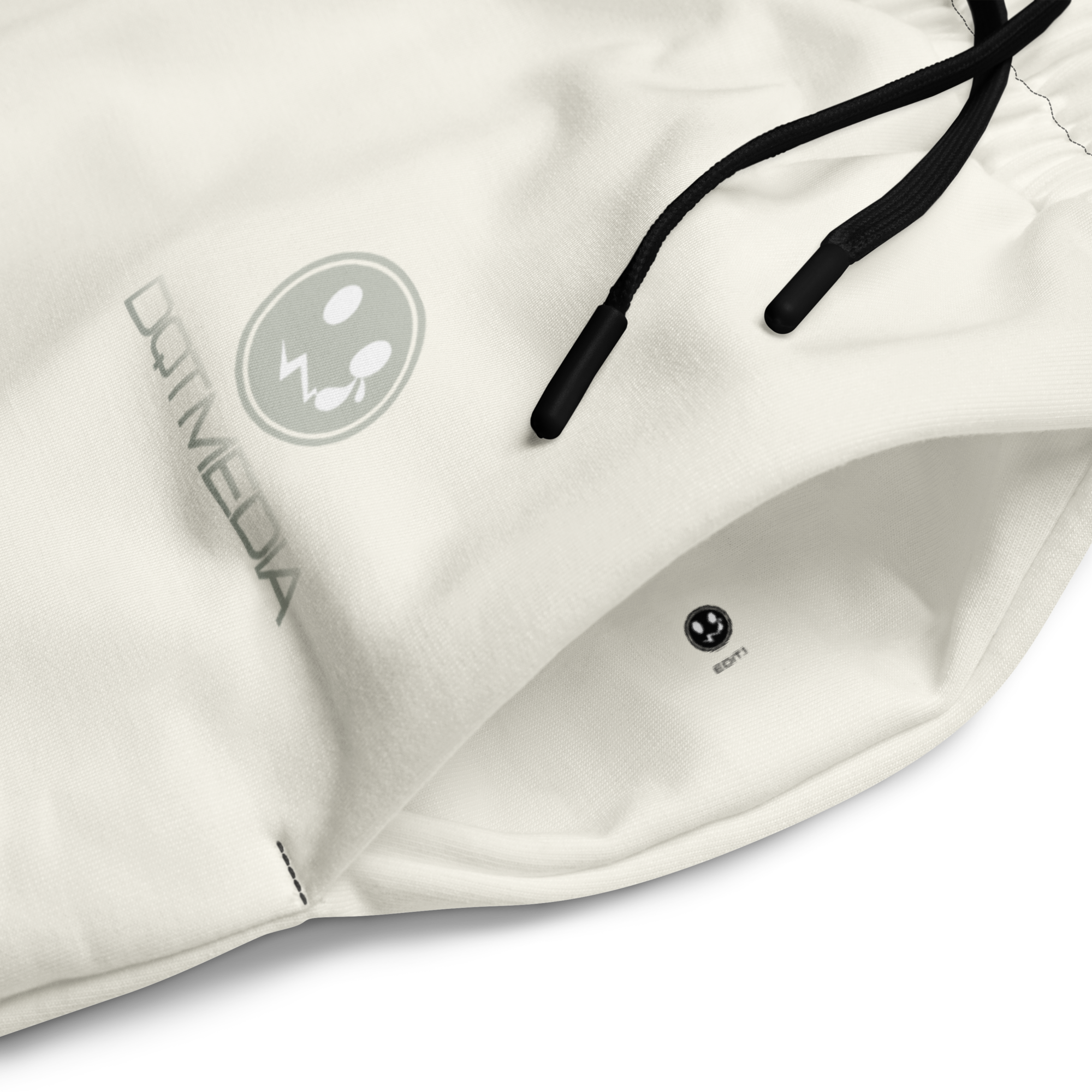 A pair of cream wide-leg joggers featuring a prominent logo and accompanying text displayed against a crisp white background. The joggers are designed for both style and comfort, with a relaxed fit that allows for ease of movement, making them perfect for casual outings or lounging. The contrasting white graphic adds a bold touch, making these joggers a standout piece in any wardrobe.