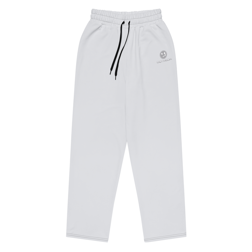 A pair of sleek grey pants featuring a subtle yet stylish logo displayed against a crisp white background. The design is minimalistic, allowing the logo to stand out without overwhelming the overall aesthetic. These pants combine comfort and sophistication, making them suitable for both casual occasions.