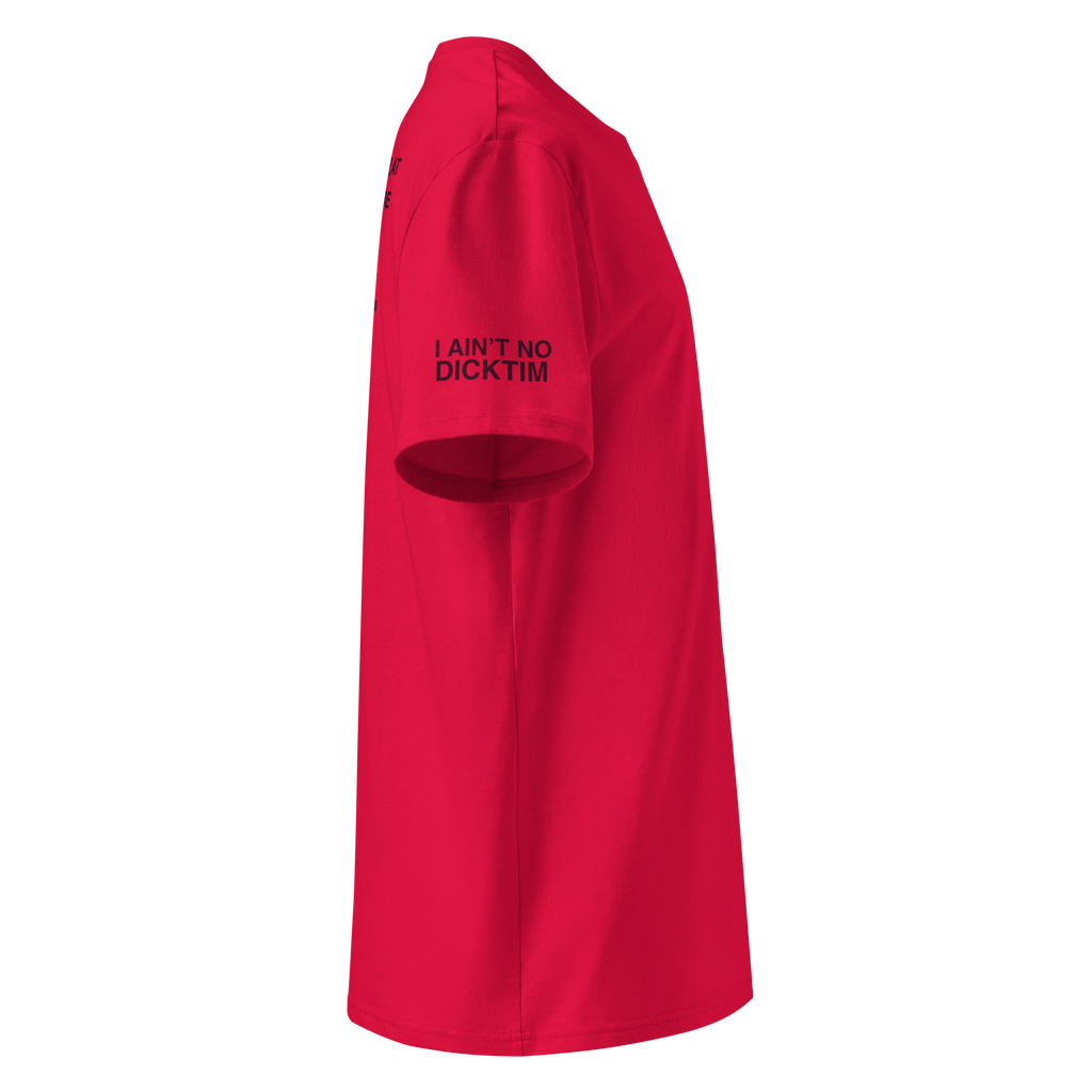 A bright red short-sleeve t-shirt shown from the side, featuring the black printed text 'I AIN'T NO DICKTIM' on the upper left chest, set against a plain white background.