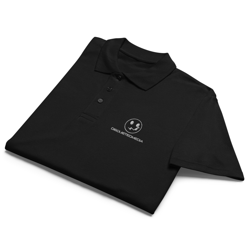 A neatly folded polo shirt featuring a crisp white design with a bold logo prominently displayed on the front. The fabric is soft to the touch, and the shirt's classic silhouette adds a touch of timeless style. 